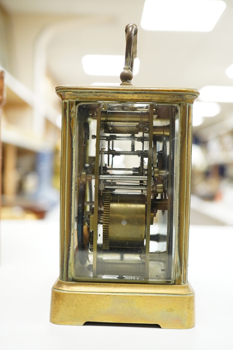 A cased brass carriage timepiece, 17.5cm high